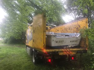 boat-removal-inside-truck-junk-rats